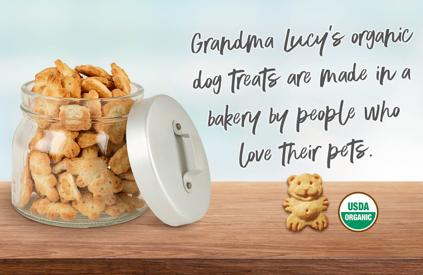 Grandma Lucy's organic dog treats, baked by people who love pets, emphasizing quality and care for dogs.