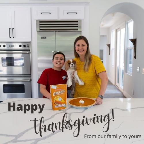 Happy Thanksgiving image of Woman, Child and Kid in kitchen. 