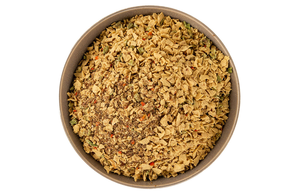 Grandma Lucy's Pureformance pre-mix dog food in a bowl.